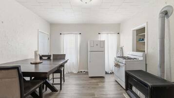 Apartment, 2 Bedrooms | Private kitchen | Fridge, oven, coffee/tea maker, toaster