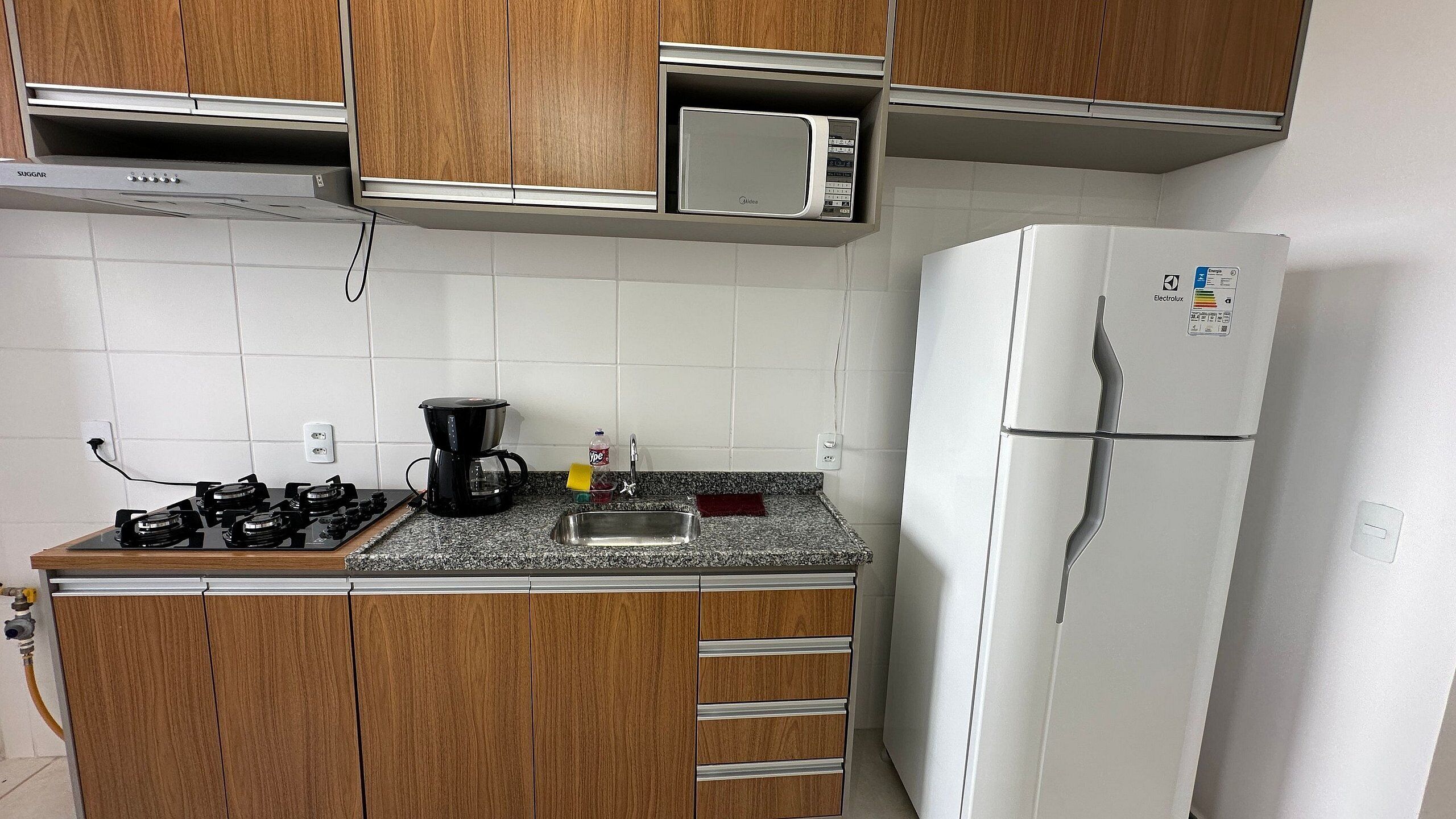 Apartamento | Cozinha privada | Micro-ondas, cooktop, cafeteira/chaleira, liquidificador