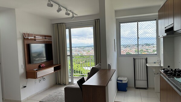 Apartment | Living area | 43-inch Smart TV with satellite channels