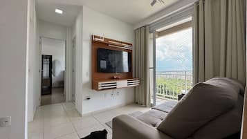 Apartment | Living area | 43-inch Smart TV with satellite channels