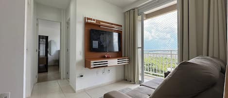 Apartment | Living area | 43-inch Smart TV with satellite channels