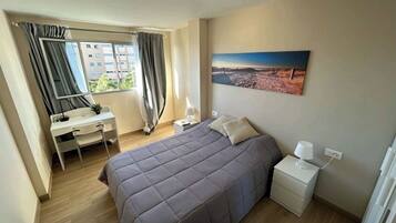 Double Room, Shared Bathroom, City View | Iron/ironing board, free WiFi