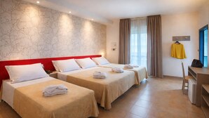 A hotel room with two single beds, a desk, a chair, and a wardrobe. - Hotel Mimosa (Riccione)
