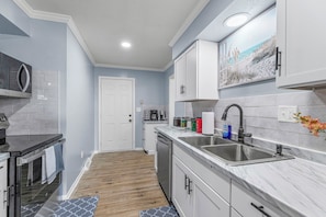 Fridge, microwave, oven, stovetop - Modern Family Gateway 2-connected duplexes by YDSH GuestMind! Guests enjoy full private access, easy self check in, and dedicated parking. (Olathe)
