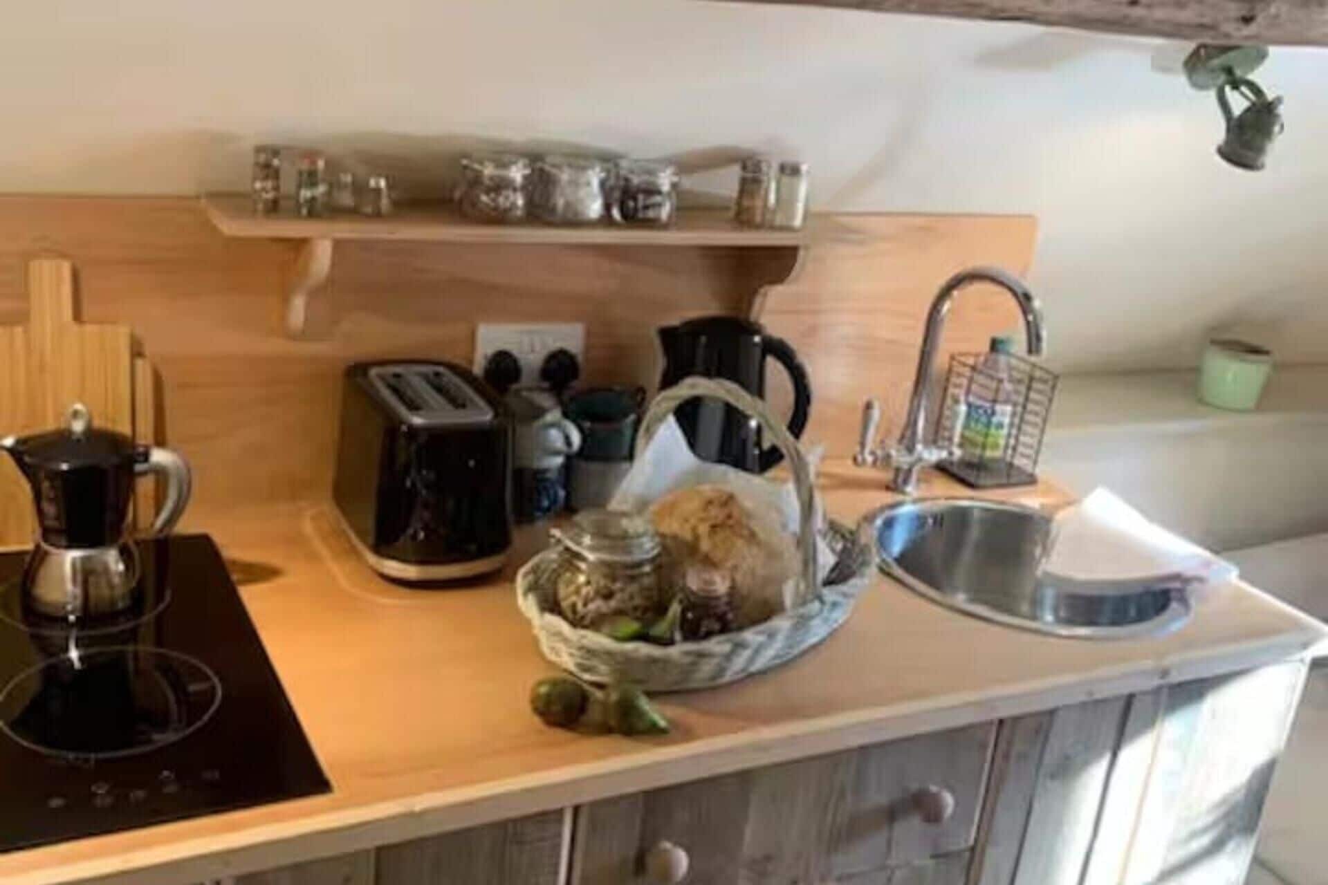 Fridge, stovetop, electric kettle, toaster