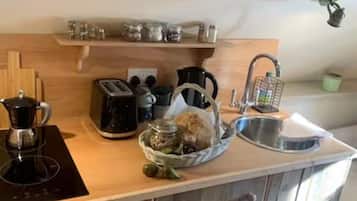 Fridge, stovetop, electric kettle, toaster