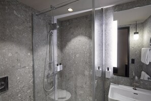 Eco-friendly toiletries, hair dryer, towels, soap