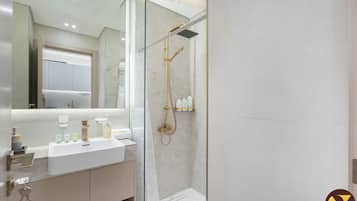 Luxury Studio, Balcony, City View | Bathroom | Shower, rainfall showerhead, free toiletries, hair dryer