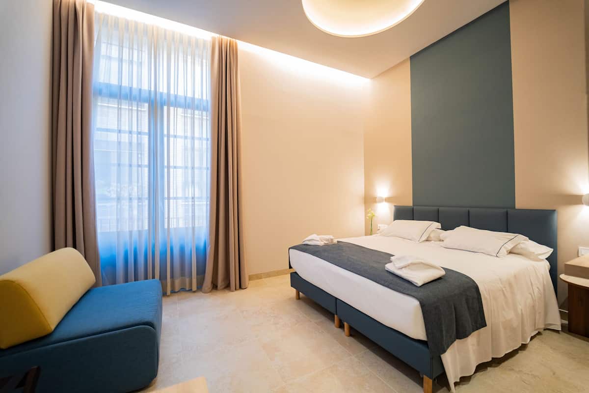 Triple Room, Balcony | Desk, free WiFi