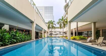 Apto Pet Friendly c 2 su tes e Garagem na Barra