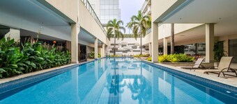 Apto Pet Friendly c 2 su tes e Garagem na Barra