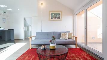 Premium Penthouse, Balcony, River View | Living area | Toys, printers