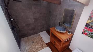 Shower, towels, soap, toilet paper