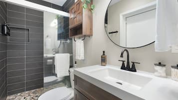 Hair dryer, towels, soap, shampoo