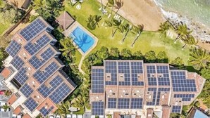 A residential area with multiple buildings, a swimming pool, and a beach. - Walk out to a secluded beach, sea turtles and Maui sunsets - Oceanfront condo (Lahaina)
