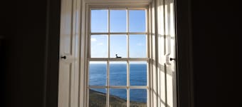 NEW to VRBO: Historic Lighthouse Cottage with Ocean Views & Aga