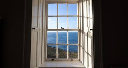 NEW to VRBO: Historic Lighthouse Cottage with Ocean Views & Aga