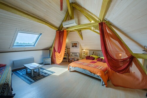 Chambre d’hôtes « Le Balcon De Loire - Chambre Curry » Evasion et sérénité au bord de Loire