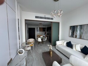 Living area - Modern & Cozy 1BR in Al Furjan, Dubai fully furnished (Dubai)