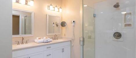 Shower, hair dryer, towels, soap