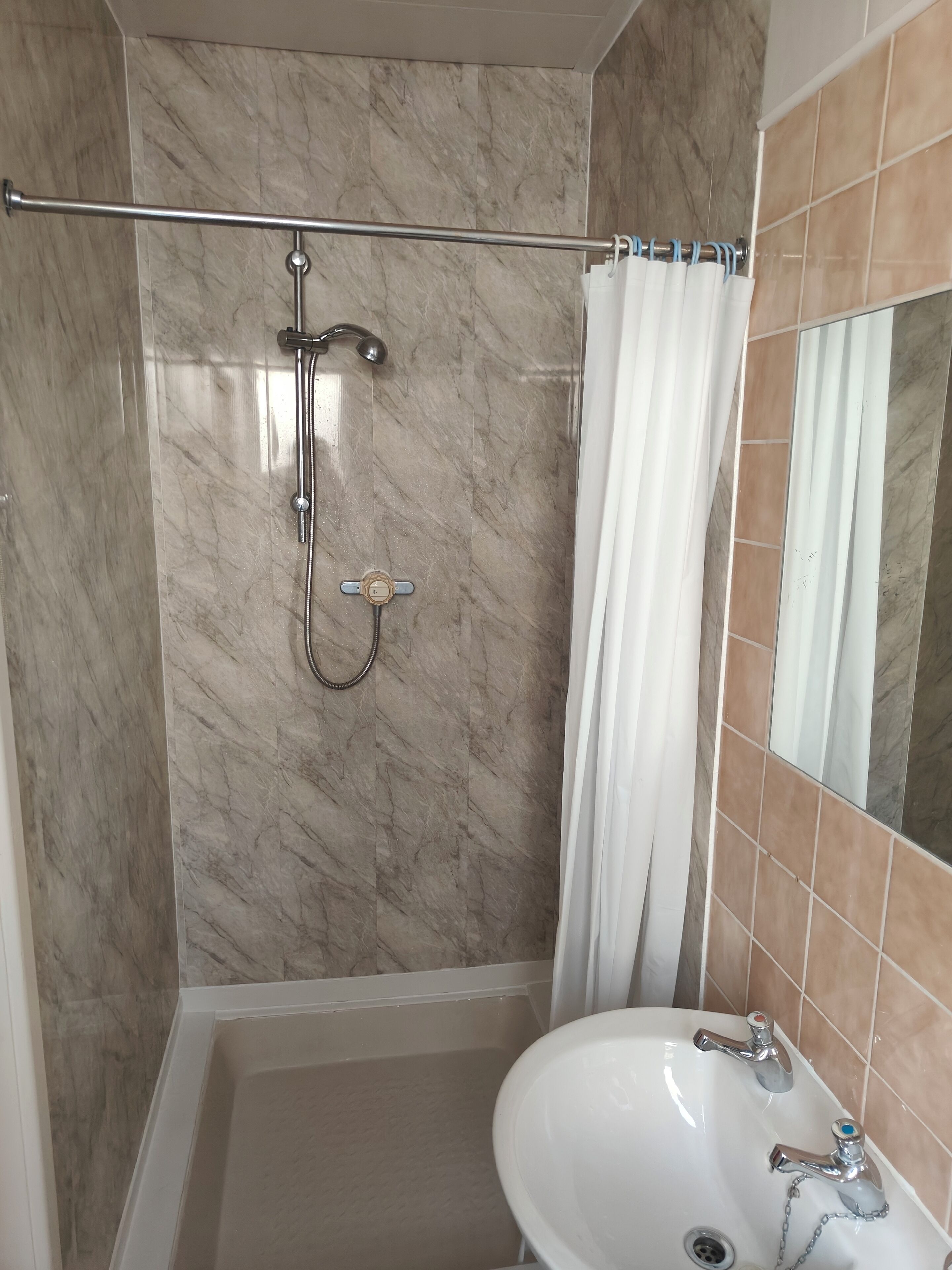 Basic Single Room | Bathroom | Shower, rainfall showerhead, towels, soap