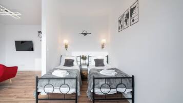 Comfort Apartment, Balcony, City View | Blackout drapes, iron/ironing board, free WiFi