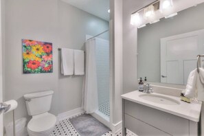 Shower, hair dryer - 2-BR condo in 12 South I Unit 201 (Nashville)