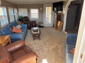 TV, books - 3 Bedroom Beach House in Gated Community w/Golf Cart and Private Beach Parking (surfside beach)