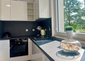 Comfort Apartment, Balcony | Private kitchen - Apartamenty Latarników Q4 Apartments (Gdańsk)