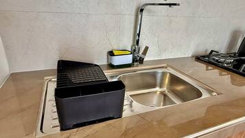 Microones, forn, placa de cuina i rentaplats