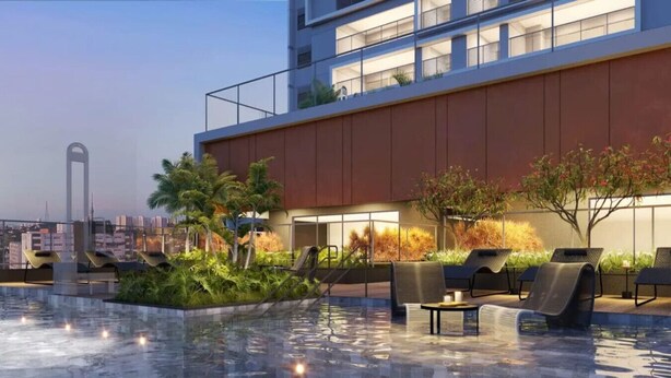 A rooftop pool area with lounge chairs, a small table, and a view of the cityscape. - Haus Mitre Vila Clementino by Wecare (São Paulo)