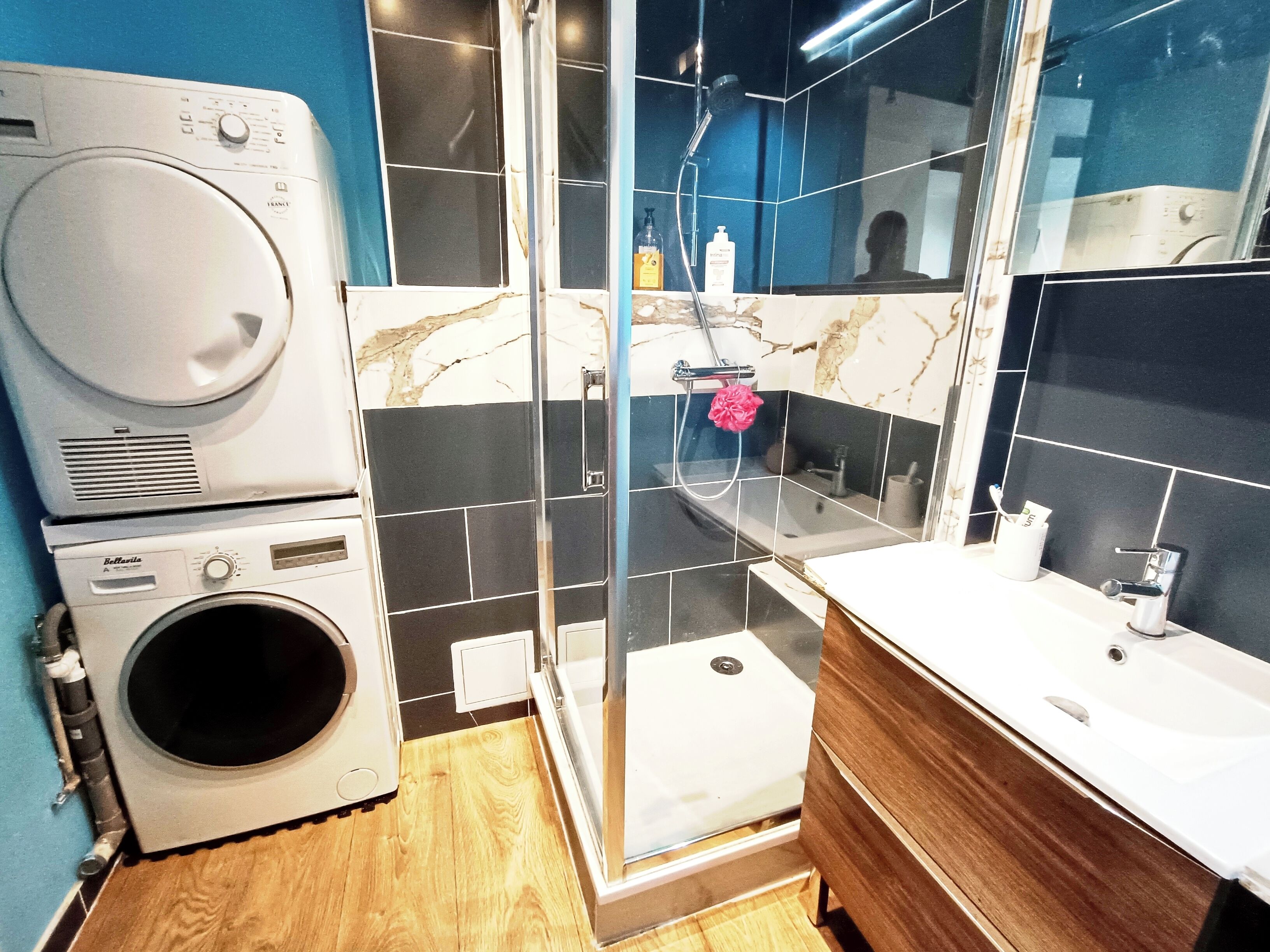 Shower, hair dryer, towels, toilet paper