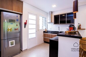 House, Garden View | Private kitchen - Casa com jacuzzi e rooftop by Wecare (Bertioga)