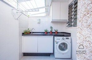 Laundry room - Casa com jacuzzi e rooftop by Wecare (Bertioga)