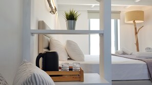 Premium Quadruple Room | Premium bedding, individually decorated, individually furnished - DL Santorini (Santorini)
