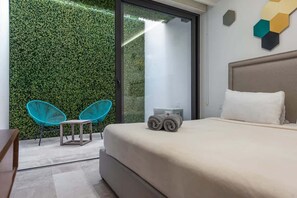 Iron/ironing board, WiFi, bed sheets - Rooftop Pool Condo Steps from 5th Ave & Beach (Playa del Carmen)
