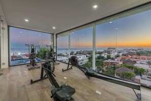 Fitness facility - Rooftop Pool Condo Steps from 5th Ave & Beach (Playa del Carmen)