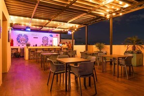 Outdoor dining - Rooftop Pool & Private Balcony Steps from Beach (Playa del Carmen)