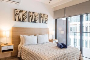 Iron/ironing board, travel cot, WiFi, bed sheets - Rooftop Pool and Ocean Views Steps from 5th Ave (Playa del Carmen)