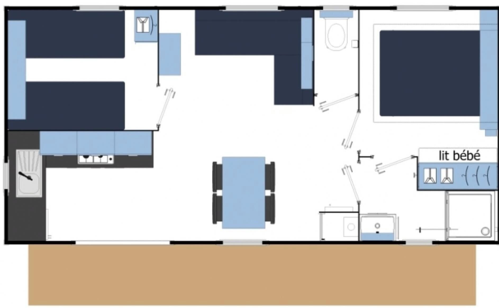 A floor plan of a hotel room with a bed, a desk, a chair, a small table, a bathroom, and a kitchenette.