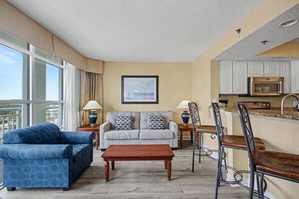Suite, 1 Bedroom, Partial Ocean View (Partial Ocean View 1 Bedroom Suite) | Living area | 38-inch flat-screen TV with cable channels, DVD player - Carolinian Beach Resort (Myrtle Beach)