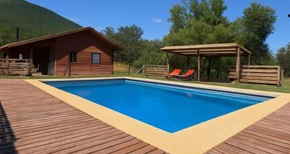 Cozy cabins with a view of the imposing Antuco Volcano