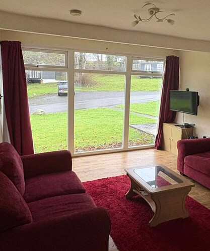 Two bedroom chalet on beautiful and wild Glan Gwna holiday park, with fishing.