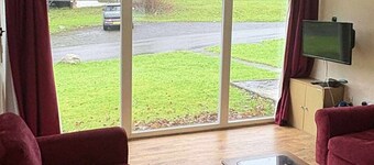 Two bedroom chalet on beautiful and wild Glan Gwna holiday park, with fishing.