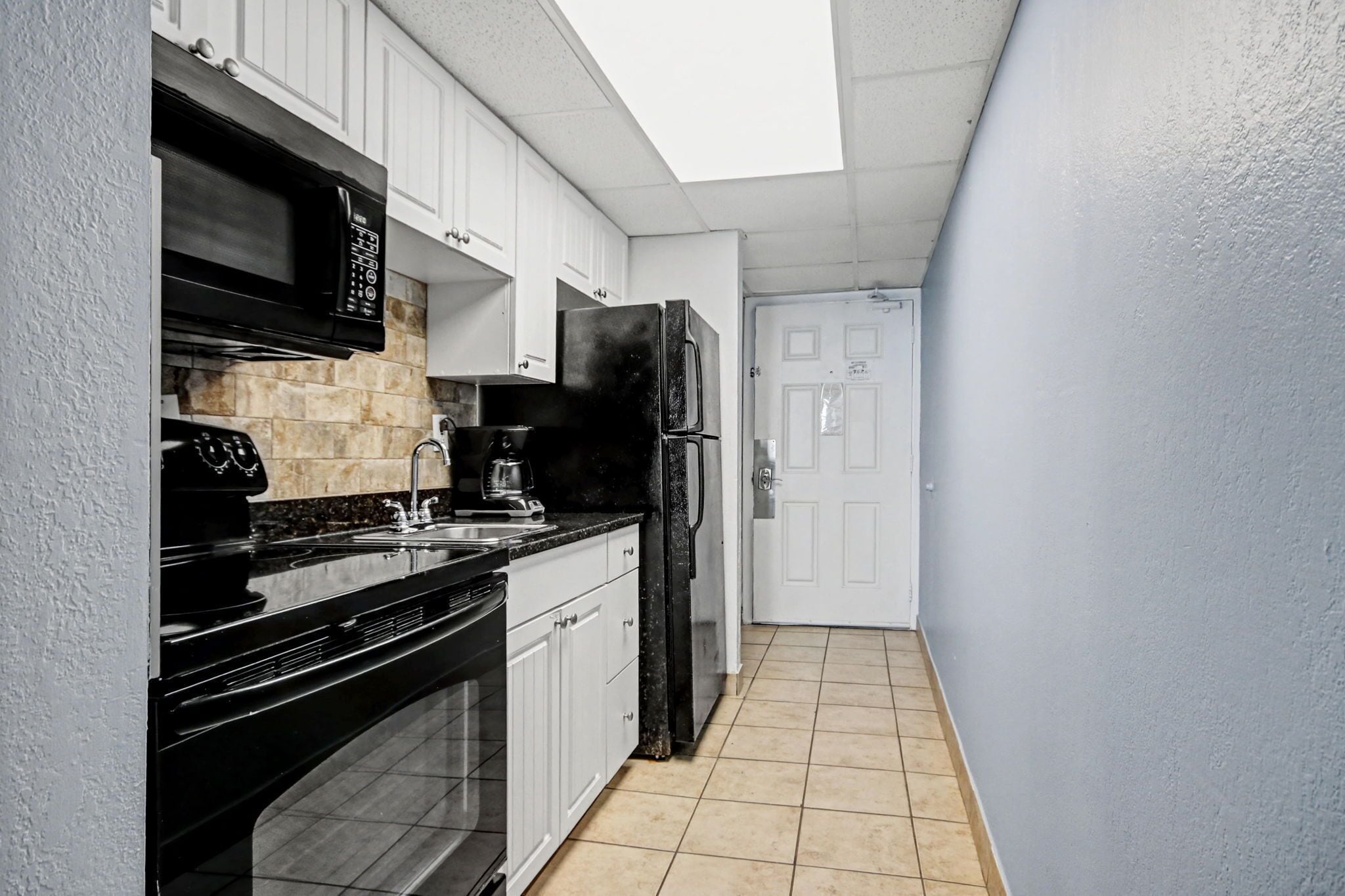 Quarto, 1 cama King, vista para o oceano (Oceanfront King Efficiency) | Cozinha privada