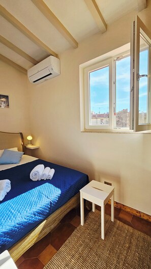 1 chambre, fer et planche à repasser, Wi-Fi gratuit, draps fournis
