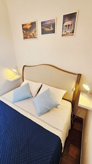 1 chambre, fer et planche à repasser, Wi-Fi gratuit, draps fournis