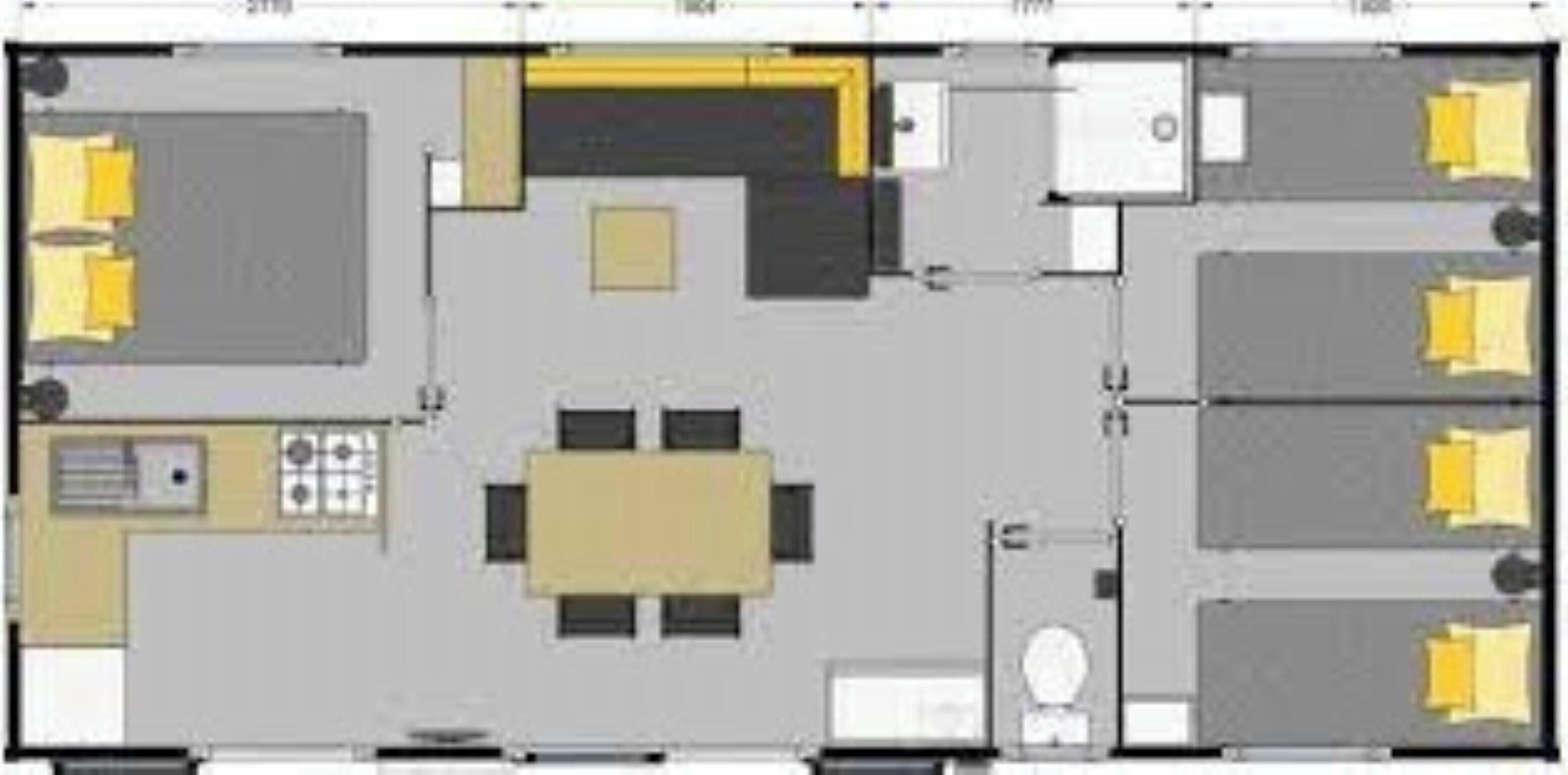 A hotel layout with a central dining area, multiple bedrooms, a kitchen, and a bathroom.