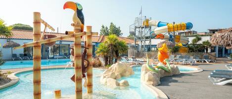 A water park with slides and a pool area.