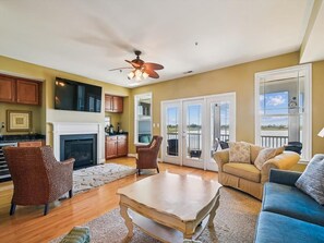 TV, fireplace, books, offices